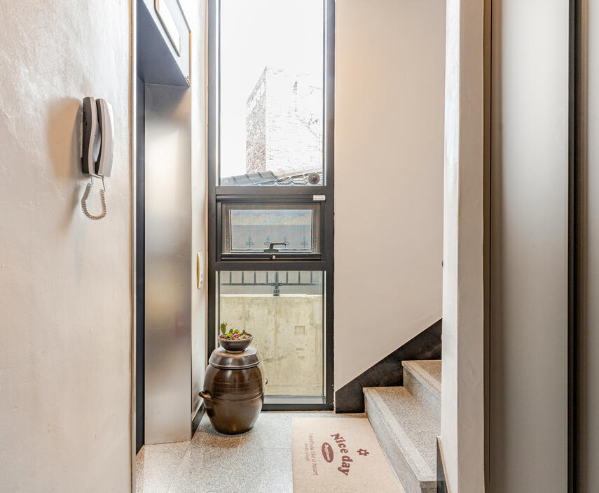 Take the elevator or stairs to the second floor. Take the elevator or stairs to the second floor.