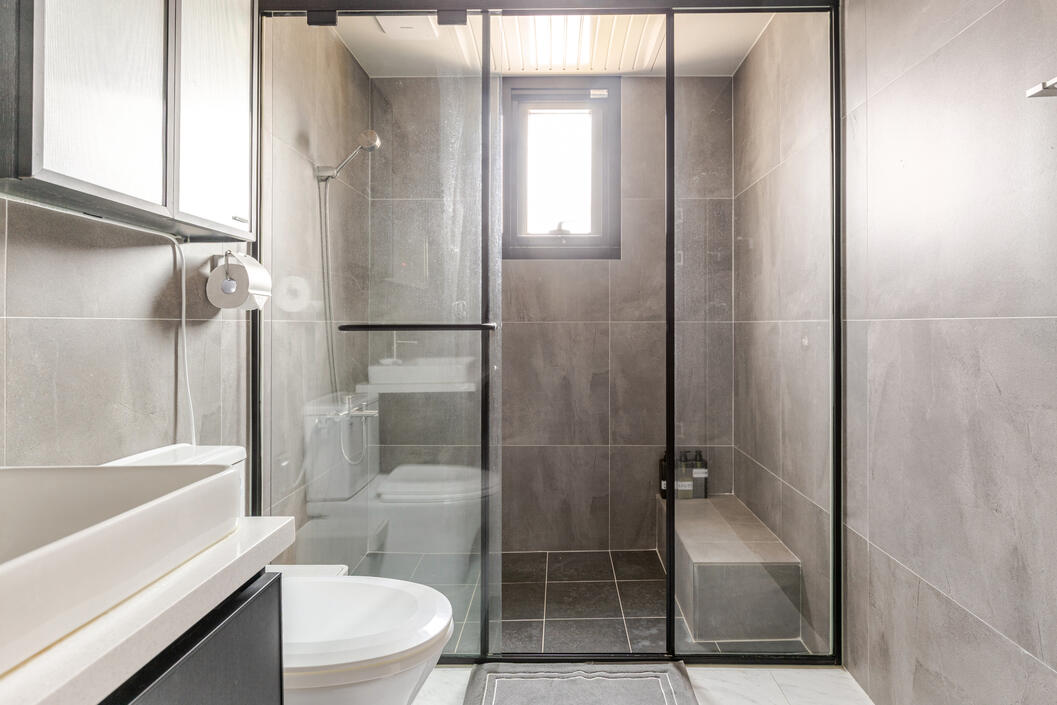 The bathroom is a large dry bath with a walk in shower