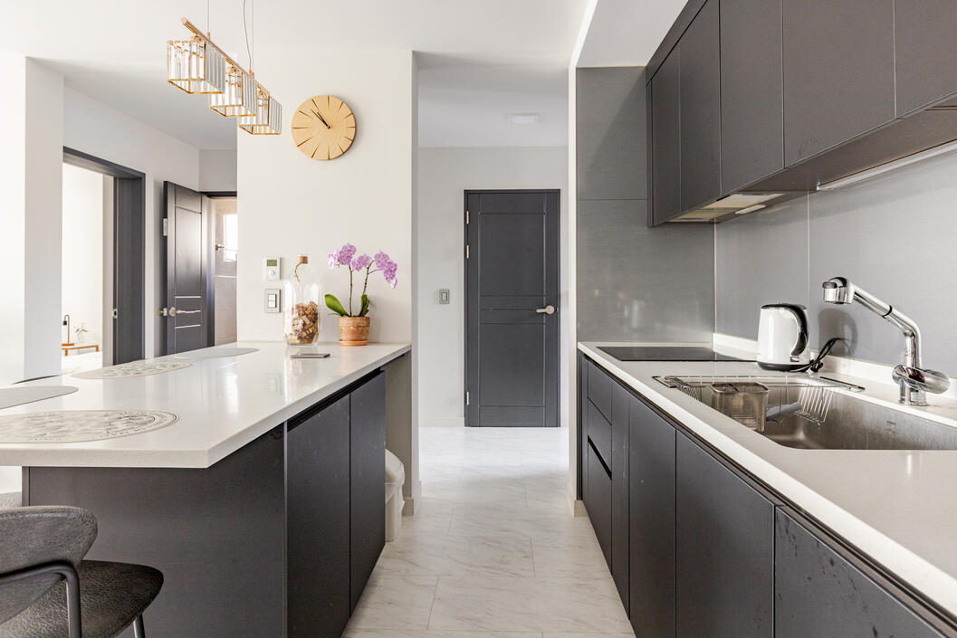 View from the refrigerator, the closed door is a storage room. The second bathroom is the open door, which is next to the second bedroom