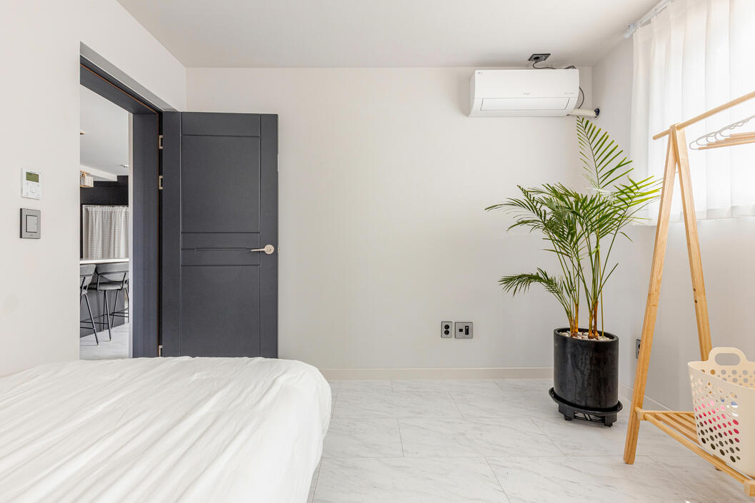 Looking out from the second bedroom to the dining area