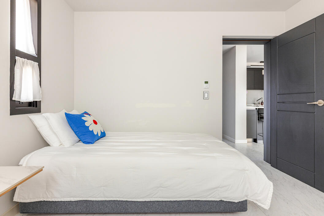 A memory foam single fits this bedroom perfectly to sleep a fourth guest