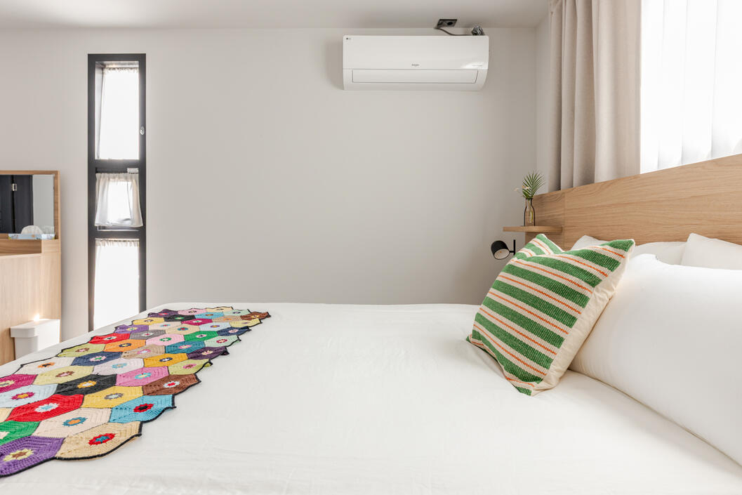 Air conditioner and blackout curtains