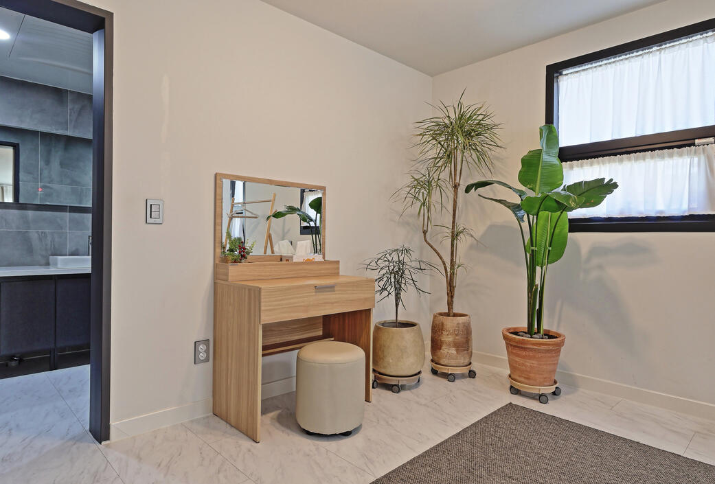 In the master bedroom is a vanity and a private master bathroom. In the master bedroom is a vanity and a private master bathroom.